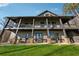 Exterior view of multi-level home with spacious deck and well-manicured lawn at 101 Bevil Ridge Se Rd, Emerson, GA 30137