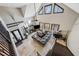Overhead view of living room with fireplace, piano, sectional couch, and floor to ceiling windows at 101 Bevil Ridge Se Rd, Emerson, GA 30137