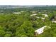 Aerial view of the community surrounded by mature trees at 26303 Plantation Ne Dr # 303, Atlanta, GA 30324