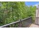Relaxing balcony view of surrounding green space at 26303 Plantation Ne Dr # 303, Atlanta, GA 30324