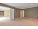 Bedroom with adjoining doorway into living room and carpet floors at 26303 Plantation Ne Dr # 303, Atlanta, GA 30324