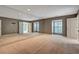 Bedroom with a wall of mirrors, and windows with wood shutters at 26303 Plantation Ne Dr # 303, Atlanta, GA 30324