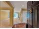 Inviting home foyer featuring hardwood floors, neutral walls, and ample natural light, leading to spacious living areas at 26303 Plantation Ne Dr # 303, Atlanta, GA 30324
