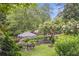Beautiful gardens featuring park benches, a seating area, and lush plantings at 26303 Plantation Ne Dr # 303, Atlanta, GA 30324