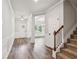 Welcoming foyer with hardwood floors, staircase, and ample natural light at 4967 Zoya Sw Ct, Atlanta, GA 30331