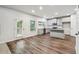 Open kitchen featuring granite countertops, stainless steel appliances, and abundant cabinetry at 4967 Zoya Sw Ct, Atlanta, GA 30331
