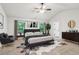 Spacious primary bedroom with neutral colors, decorative rug, and a walk-in closet at 4967 Zoya Sw Ct, Atlanta, GA 30331