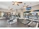 Community gym filled with treadmills, elliptical machines, and weight lifting equipment at 2685 Gateview Ct, Cumming, GA 30040