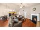Cozy living room with fireplace and skylights that bring in ample natural light at 2685 Gateview Ct, Cumming, GA 30040