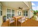 Comfortable outdoor patio with ceiling fan, dining table and chairs, ideal for entertaining at 2685 Gateview Ct, Cumming, GA 30040