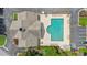 Aerial view of community pool area and clubhouse, highlighting amenities and parking at 2685 Gateview Ct, Cumming, GA 30040