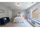 Cozy bedroom features a window bench, comfortable furniture, and neutral décor at 3018 Patriot Square, Marietta, GA 30064