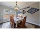 Bright dining room featuring modern lighting and an adjacent window at 3018 Patriot Square, Marietta, GA 30064