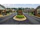 Gated community entrance with well-maintained landscaping and a secure entry system at 3018 Patriot Square, Marietta, GA 30064
