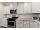 Close up of kitchen featuring stainless appliances and granite countertops at 3018 Patriot Square, Marietta, GA 30064
