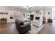 Spacious living room with hardwood floors, ample seating, and a view to the backyard at 3018 Patriot Square, Marietta, GA 30064