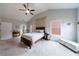 Large main bedroom featuring vaulted ceiling and comfortable bed with decorative pillows at 3018 Patriot Square, Marietta, GA 30064
