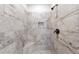 Close up of the tiled walk-in shower featuring a shower niche and corner seat at 3018 Patriot Square, Marietta, GA 30064