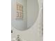 Modern bathroom featuring a round mirror over sink at 5451 Baybrook Cir, South Fulton, GA 30349