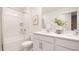 Clean bathroom featuring a tub with shower, dual sinks with ample counter space, and modern fixtures at 5451 Baybrook Cir, South Fulton, GA 30349
