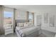 A primary bedroom offering an inviting space with large windows, neutral tones, and sophisticated decor at 5451 Baybrook Cir, South Fulton, GA 30349