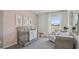 Charming Bedroom with a crib, soft colors, and a comfortable chair at 5451 Baybrook Cir, South Fulton, GA 30349
