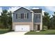 Charming two-story home with blue siding, brick accents, and a two-car garage at 5451 Baybrook Cir, South Fulton, GA 30349