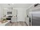 Well-designed kitchen features modern appliances, light gray cabinets, and a functional layout at 5451 Baybrook Cir, South Fulton, GA 30349