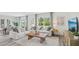 Inviting living room featuring stylish sofas, a coffee table, and large windows at 5451 Baybrook Cir, South Fulton, GA 30349