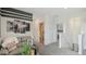 Cozy loft area leading to rooms, featuring movie decor and comfortable seating at 5451 Baybrook Cir, South Fulton, GA 30349
