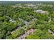 Aerial view of a neighborhood showcasing mature trees and local architecture at 210 Evans Dr, Decatur, GA 30030
