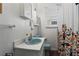 Clean bathroom featuring a sink, toilet, and shower with decorative curtain at 210 Evans Dr, Decatur, GA 30030