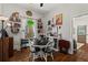 Charming dining room with a round table, unique decor, and natural light at 210 Evans Dr, Decatur, GA 30030
