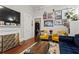 Cozy living room with fireplace, unique decor, and comfortable seating arrangement at 210 Evans Dr, Decatur, GA 30030