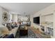 Bright and inviting living room showcasing an open layout with a view to the kitchen at 210 Evans Dr, Decatur, GA 30030