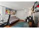 Spacious living room with a couch, futon, posters and shelves at 210 Evans Dr, Decatur, GA 30030