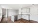 Charming kitchen with granite counters, stainless steel dishwasher, and wood flooring at 5449 Baybrook Cir, South Fulton, GA 30349