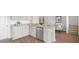 Modern kitchen features stainless steel appliances, granite countertops, and hardwood floors at 5449 Baybrook Cir, South Fulton, GA 30349