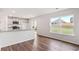 Modern kitchen featuring granite countertops, stainless steel appliances, and backyard view at 5449 Baybrook Cir, South Fulton, GA 30349