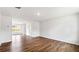 Spacious living room with hardwood floors, white walls, and ample natural light at 5449 Baybrook Cir, South Fulton, GA 30349
