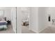 Bedroom view showcasing neutral color scheme and connected rooms, creating a cohesive living space at 5455 Baybrook Cir, South Fulton, GA 30349