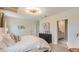 Spacious bedroom featuring ample natural light, elegant decor, and an ensuite bathroom at 5455 Baybrook Cir, South Fulton, GA 30349