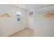 Walk-in closet featuring built-in shelving and a window offering natural light at 5455 Baybrook Cir, South Fulton, GA 30349