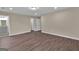Bright bedroom features hardwood floors and access to an ensuite bathroom at 250 Stonecreek Pkwy, Covington, GA 30016