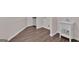 Laundry room with new vinyl plank flooring and utility sink at 250 Stonecreek Pkwy, Covington, GA 30016