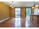 Dining area with hardwood floors and sliding glass doors leading to an outdoor space at 275 Autry Mill Ln, Suwanee, GA 30024