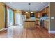 Modern kitchen with an island, stainless steel appliances, and sliding door to a deck at 275 Autry Mill Ln, Suwanee, GA 30024