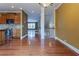 Open-concept living space features hardwood floors, stainless appliances, and a staircase at 275 Autry Mill Ln, Suwanee, GA 30024