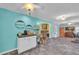 Wide view of the dining area with the built-in coffee bar adjacent to the living room at 676 Smith Store Rd, Covington, GA 30016