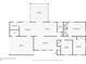 Detailed floor plan of the home showcasing the layout, including the living room, kitchen, bedrooms, garage, and sunroom at 676 Smith Store Rd, Covington, GA 30016